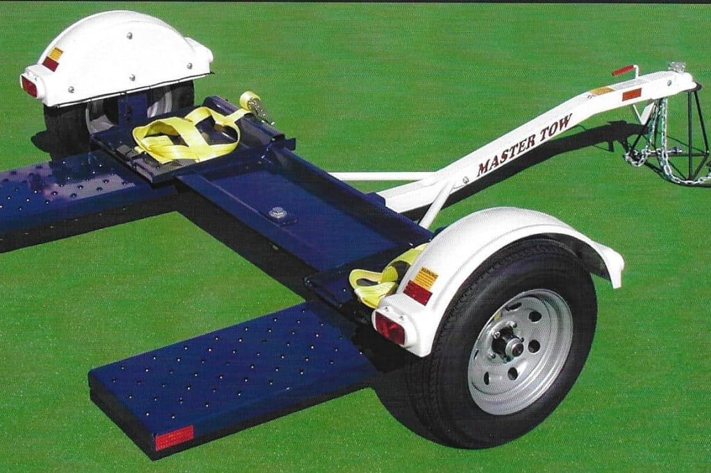 tow dolly vs flatbed trailer pros and cons